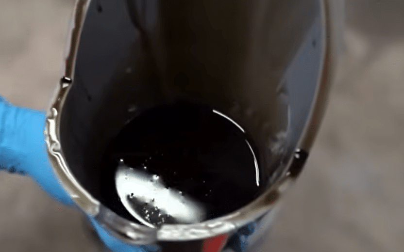 What Does Black and Gritty Engine Oil Actually Mean